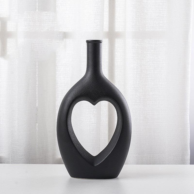 Long vase noir coeur